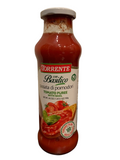 A glass bottle of Torrente con Basilico Tomato Puree with Basil, featuring a white cap.